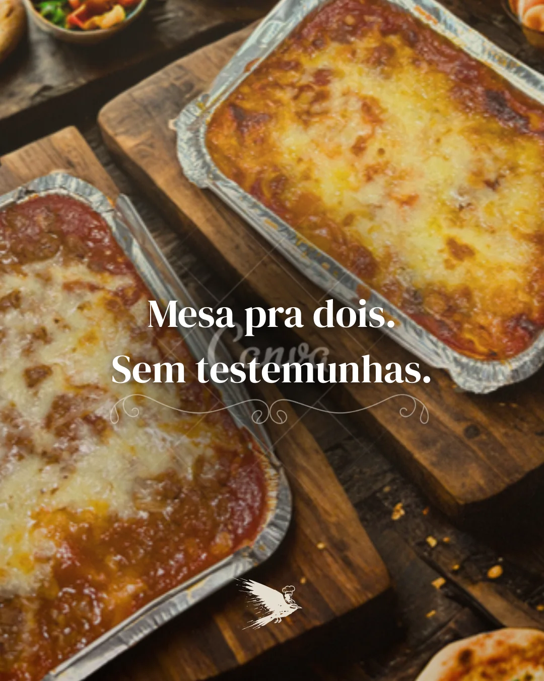 Campaign piece showing two lasagna trays on a wooden board, captioned in Portuguese, a table for two, no witnesses.